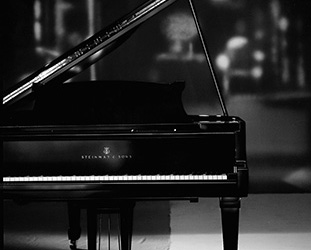 Am Klavier zu vier Händen Steinway Flügel