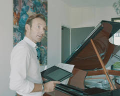 Spirio lover: Vincent lets his grand piano play for him.