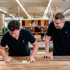 What is happening in the veneering department?